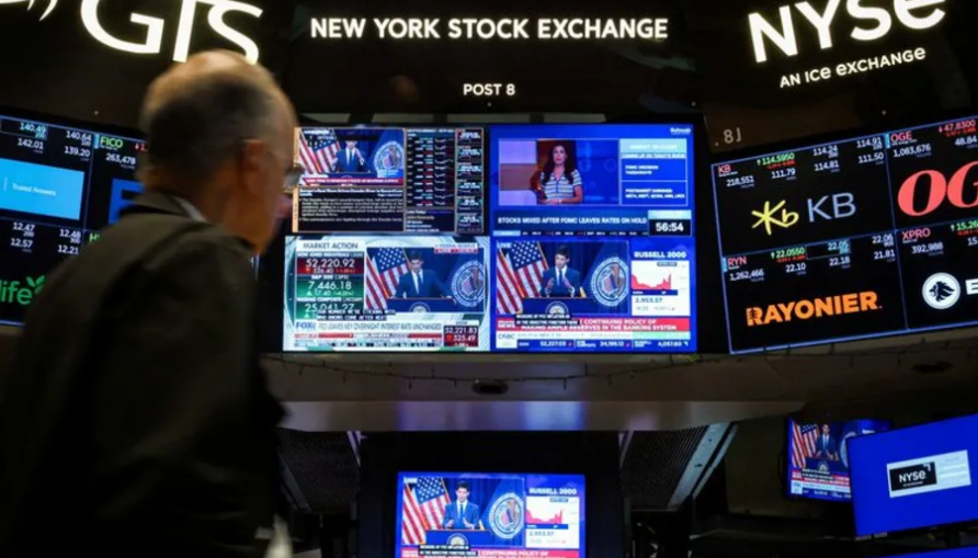 FILE PHOTO: A trader works on the floor of the New York Stock Exchange (NYSE) in New York City, U.S., July 29, 2026. REUTERS/Brendan McDermid/File Photo · Reuters