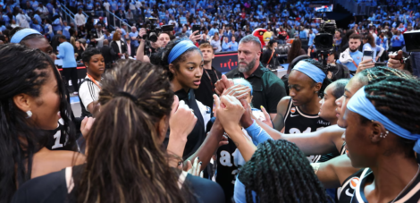 Angel Reese and her Atlanta Dream teammates celebrate after their 97-71 victory over the Golden State Valkyries in Game 3 of the WNBA finals on Wednesday night at State Farm Arena. Photograph: Kevin C Cox/Getty Images