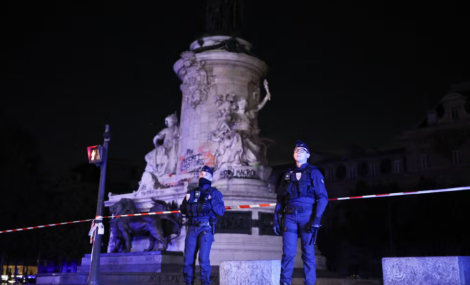 Police officers in Paris on Tuesday during a partial curfew put in place after last weekend’s demonstrations.Credit...Simon Wohlfahrt/Agence France-Presse — Getty Images