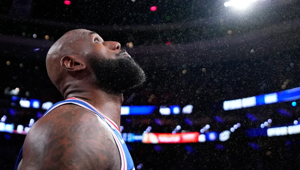 Philadelphia 76ers’ LeBron James tosses chalk into the air before an NBA basketball game against the Cleveland Cavaliers Thursday, Oct. 22, 2026, in Philadelphia. (AP Photo/Matt Slocum)
