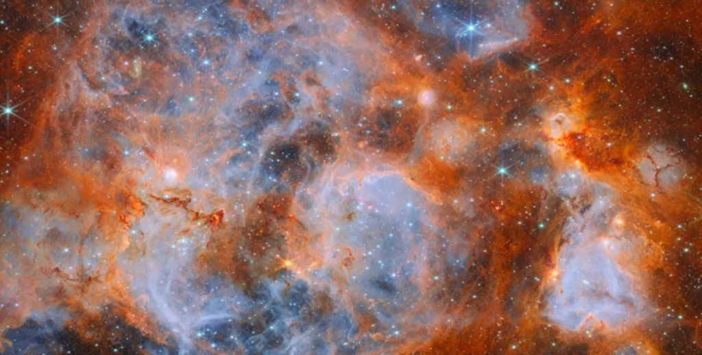 Pemandangan menakjubkan nebula emisi N159 di Awan Magellan Besar yang diambil oleh Teleskop Luar Angkasa James Webb.(ESA/Webb, NASA & CSA, E. Sabbi, M. Zamani (ESA/Webb) Ucapan terima kasih: M. H. Özsaraç)