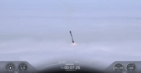 The Falcon 9 first stage that launched the Transporter-18 mission pierces the clouds above California's Vandenberg Space Force Base during its return to Earth on Oct. 1, 2026. (Image credit: SpaceX)