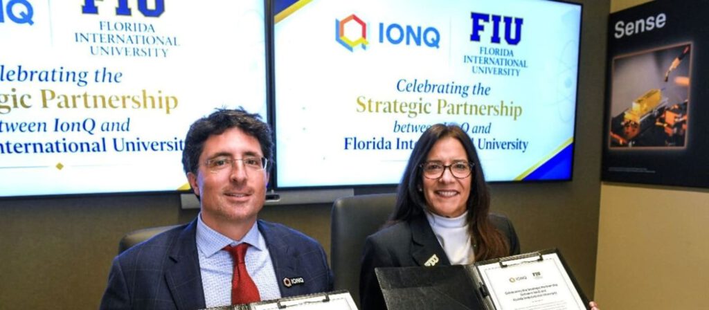IonQ Chairman and CEO Niccolo de Masi and FIU Provost, Executive Vice President and Chief Operating Officer Elizabeth M. Béjar at IonQ headquarters in College Park, Maryland. (Photo credit: Taimy Alvarez/Florida International University)