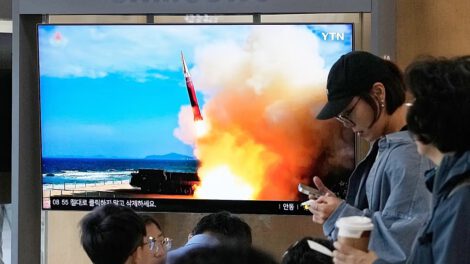 A TV screen shows a file image of a North Korean missile launch during a news program at Seoul Railway Station in Seoul, South Korea, Saturday, Oct. 3, 2026. - Copyright AP Photo