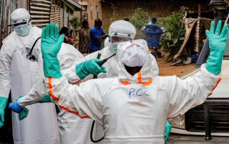 Members of the Civil Protection, a local community-based team that works to help mitigate the spread of the Ebola virus and ensure burials happen safely and quickly, wearing personal protective equipment (PPE) in Bunia, Ituri province, Democratic Republic of Congo, July 10, 2026. REUTERS/Gradel Muyisa Mumbere