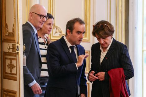 France's reappointed Prime Minister Sebastien Lecornu gestures next to France's Minister for Agriculture and Food Sovereignty Annie Genevard and France's Minister for Economy, Finances and Industrial and Digital Sovereignty Roland Lescure as he welcomes the newly-appointed members of his cabinet for a meeting, at the Hotel Matignon in Paris, France, October 13, 2025. ALAIN JOCARD/Pool via REUTERS
