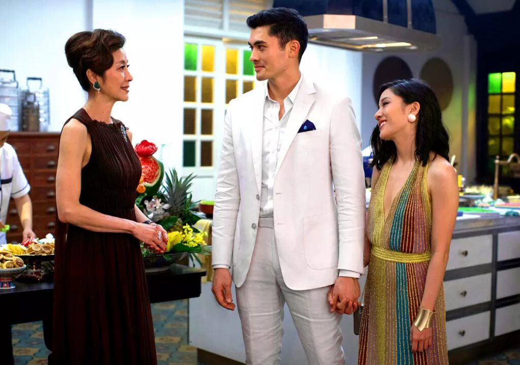 From left, Michelle Yeoh, Henry Golding and Constance Wu will reprise their “Crazy Rich Asian” roles in HBO’s new series. (Sanja Bucko / Warner Bros. Pictures)