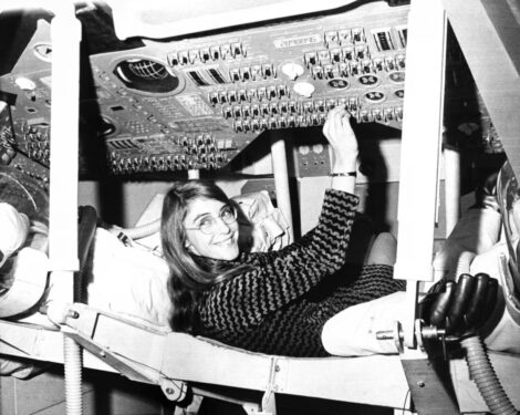 Margaret Hamilton sits in mock-up of an Apollo command module on display at the Cambridge school, November 25, 1969, where she headed the group that programmed the Intrepid spacecraft's pinpoint landing on the moon. AP